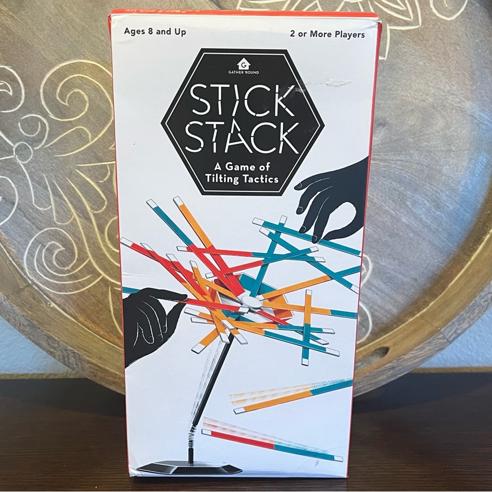 Gather ‘Round Stick Stack: A Game of Tilting Tactics, 2 or More Players, Ages 8+